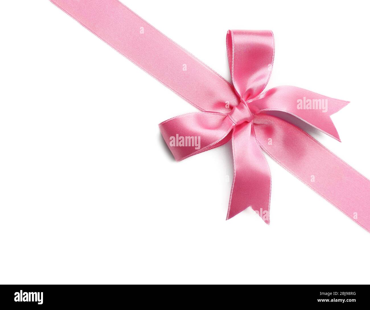 Pink ribbon bow on white background Stock Photo - Alamy
