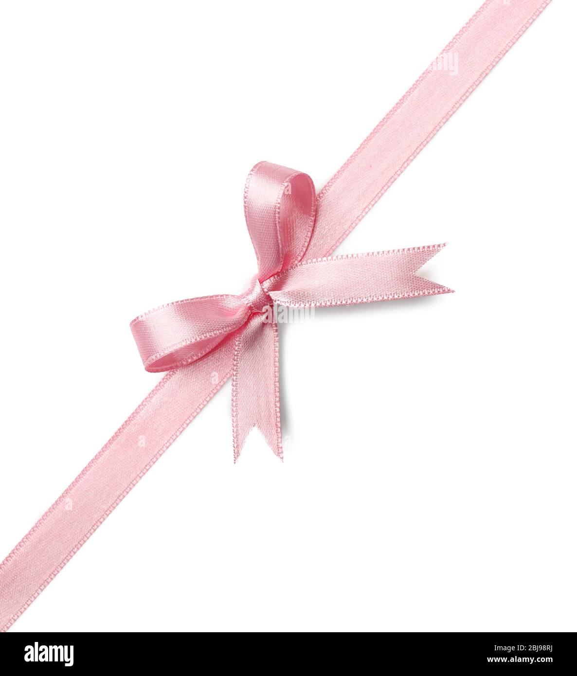 Pink ribbon bow on white background Stock Photo - Alamy