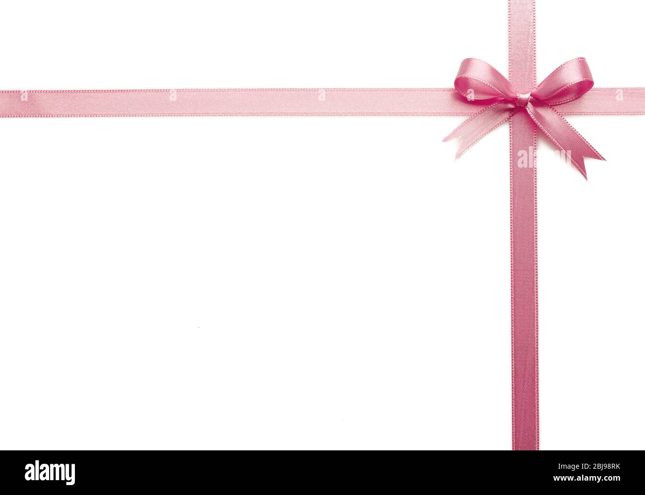 Pink ribbon bow on white background Stock Photo - Alamy