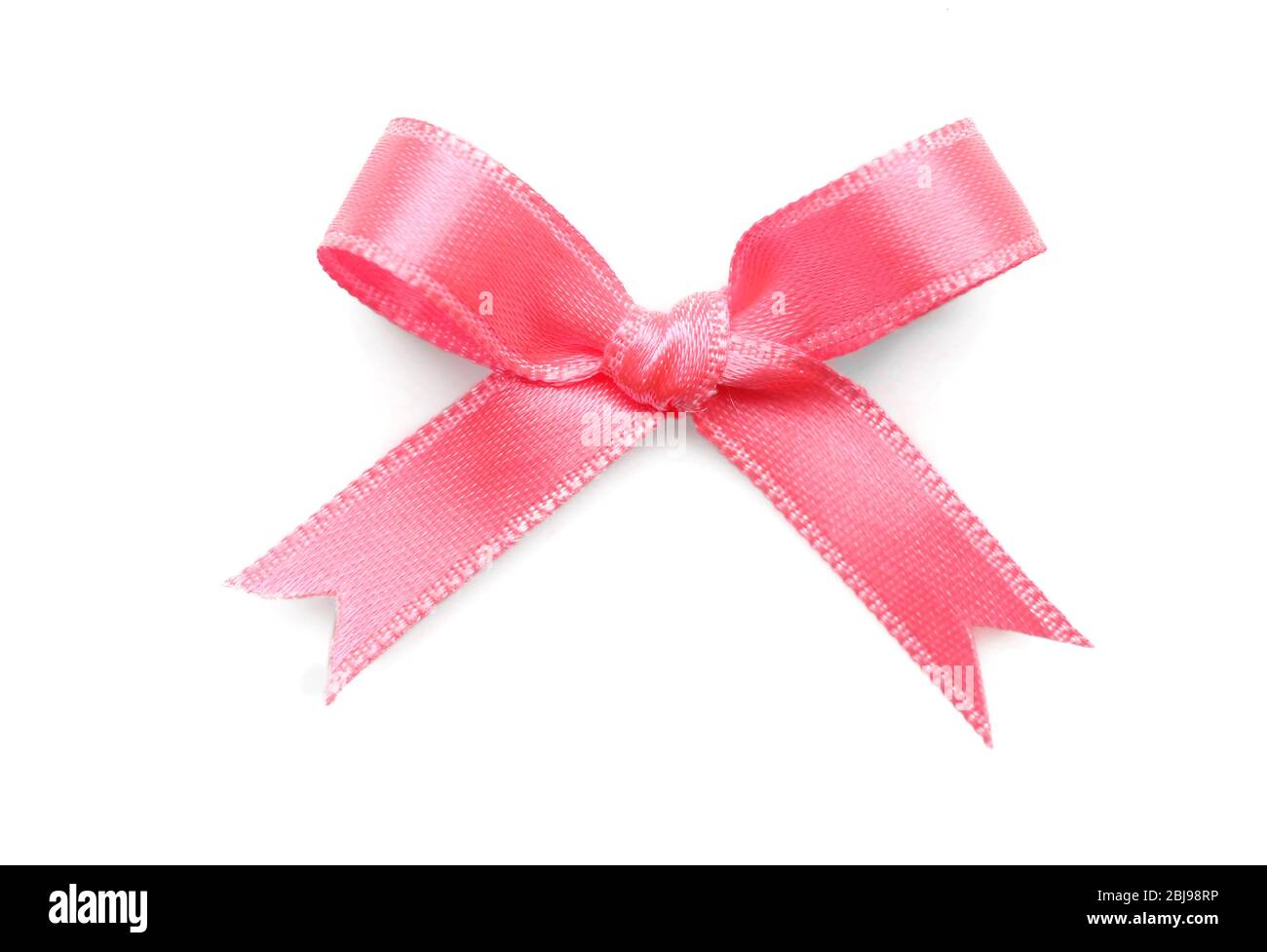 Pink ribbon bow on white background Stock Photo - Alamy