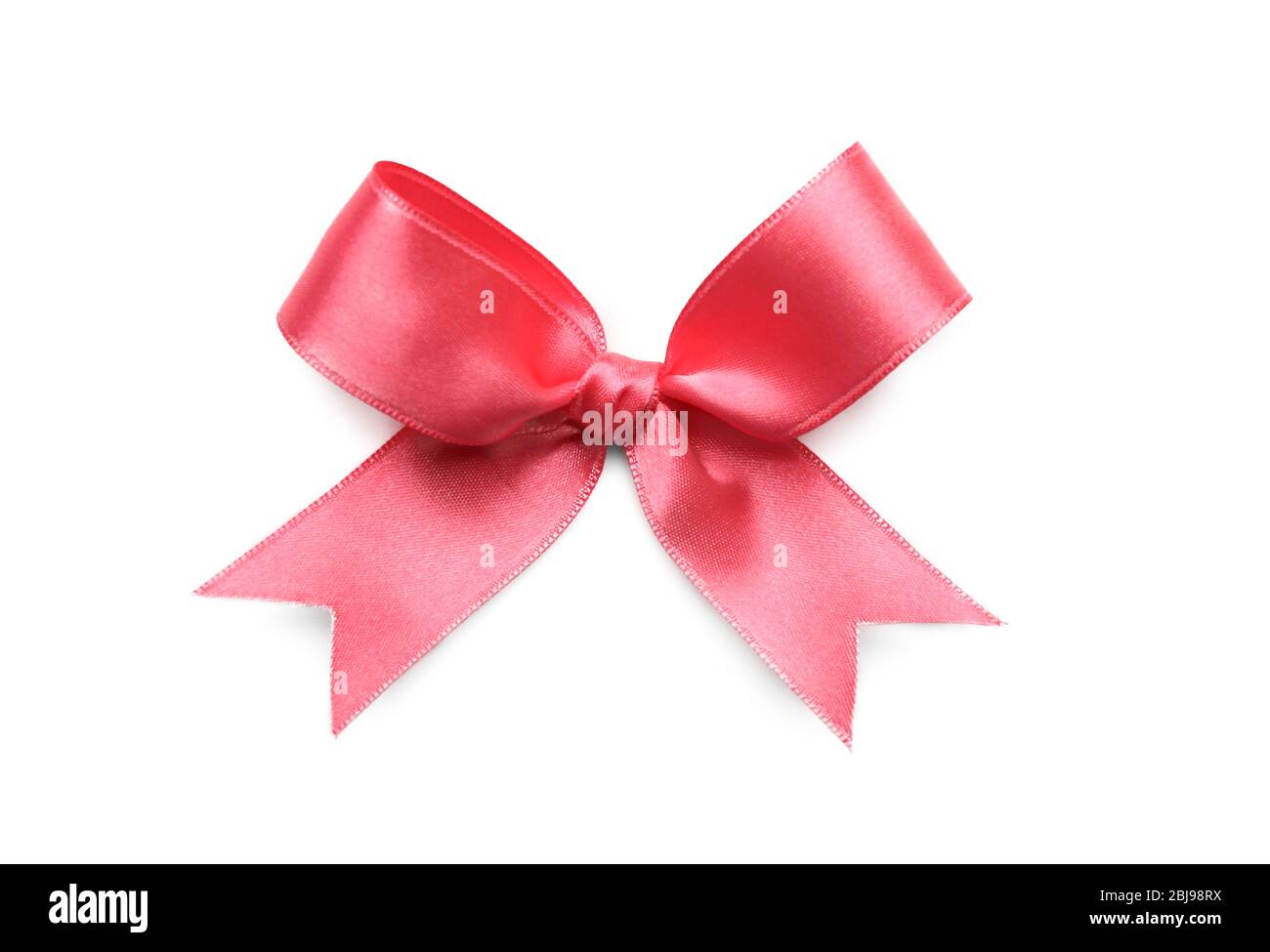 Pink ribbon bow on white background Stock Photo - Alamy