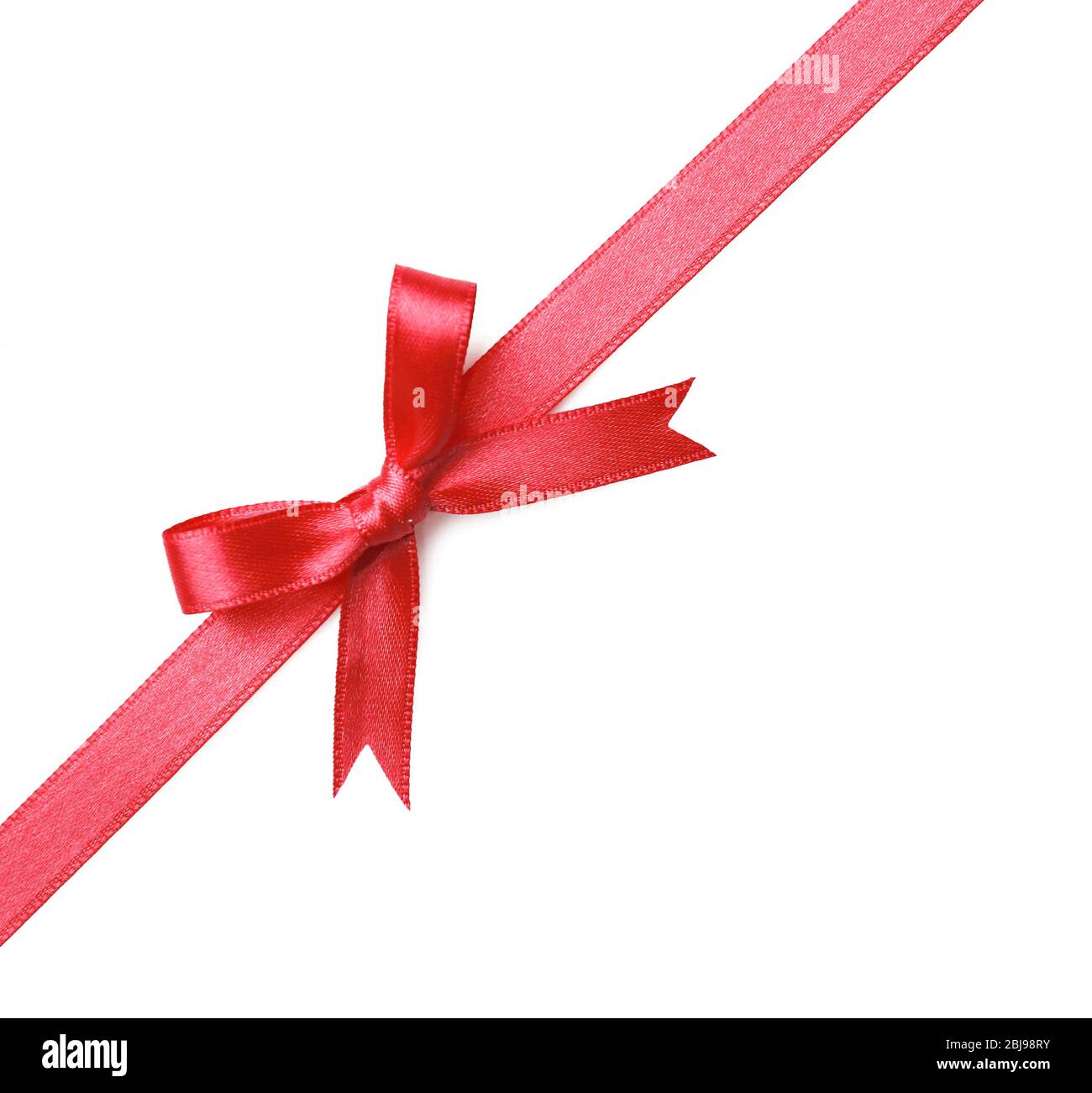 Pink ribbon bow on white background Stock Photo - Alamy