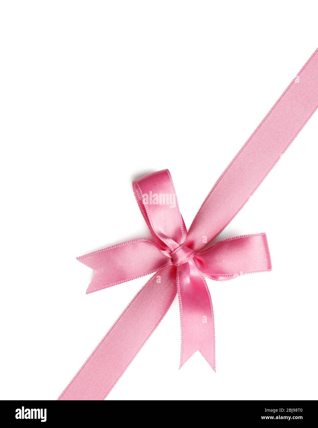 Pink ribbon bow on white background Stock Photo - Alamy