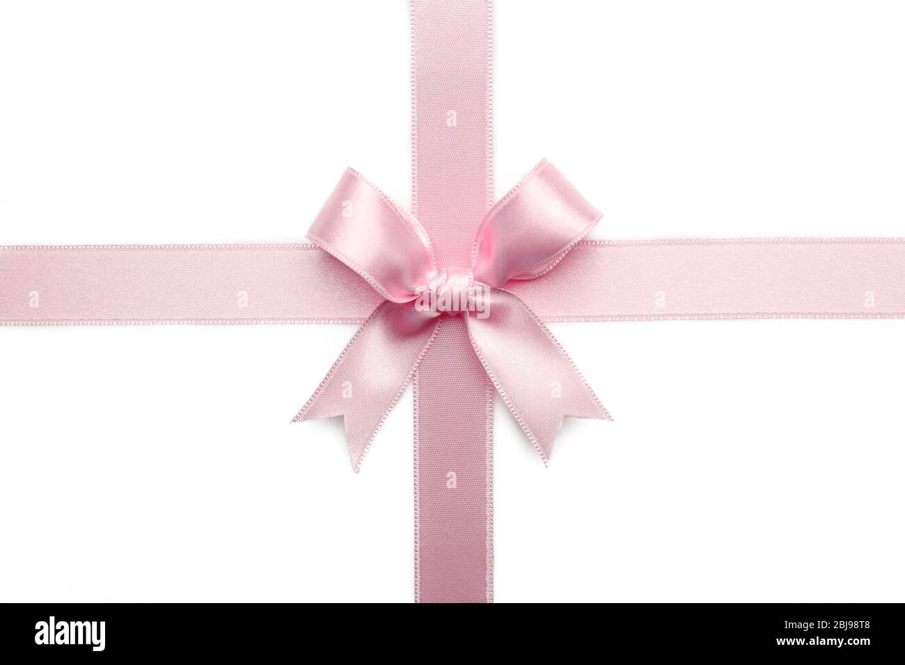Pink ribbon bow on white background Stock Photo - Alamy
