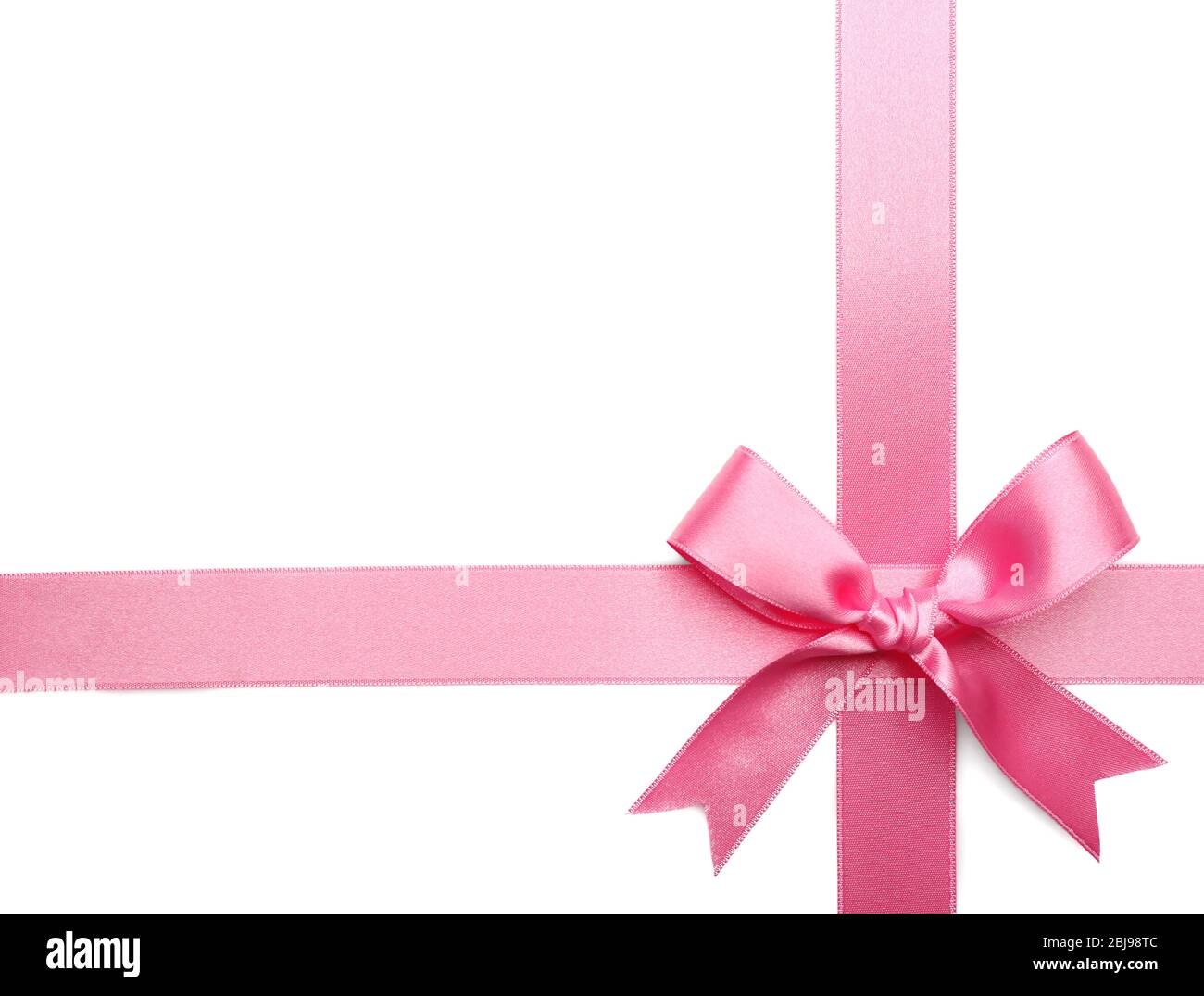 Pink ribbon bow on white background Stock Photo - Alamy