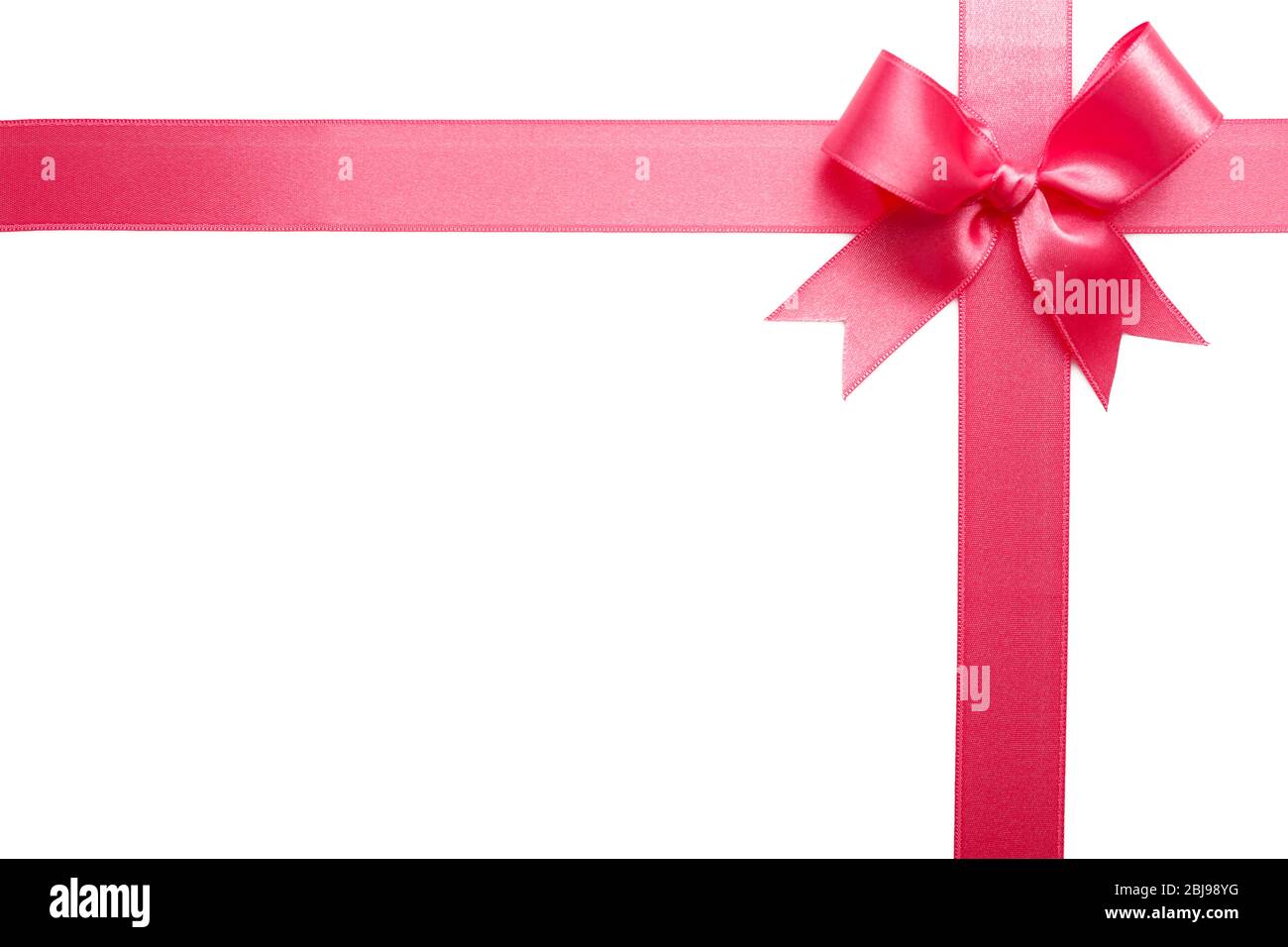 Pink ribbon bow on white background Stock Photo - Alamy