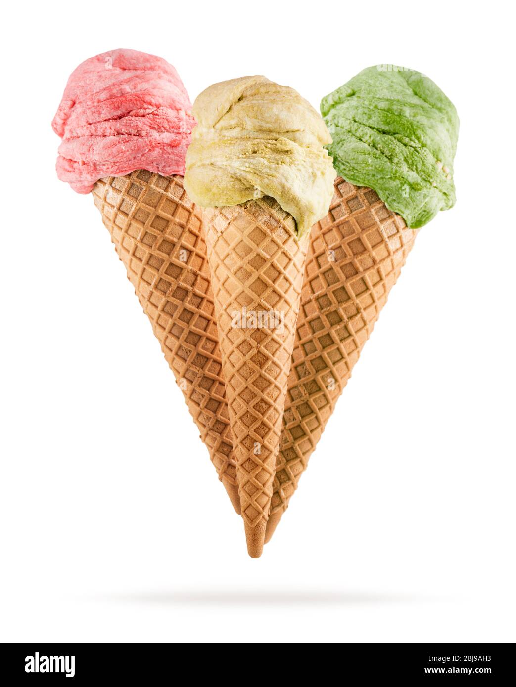 Ice cream cones with different flavors on white background Stock Photo