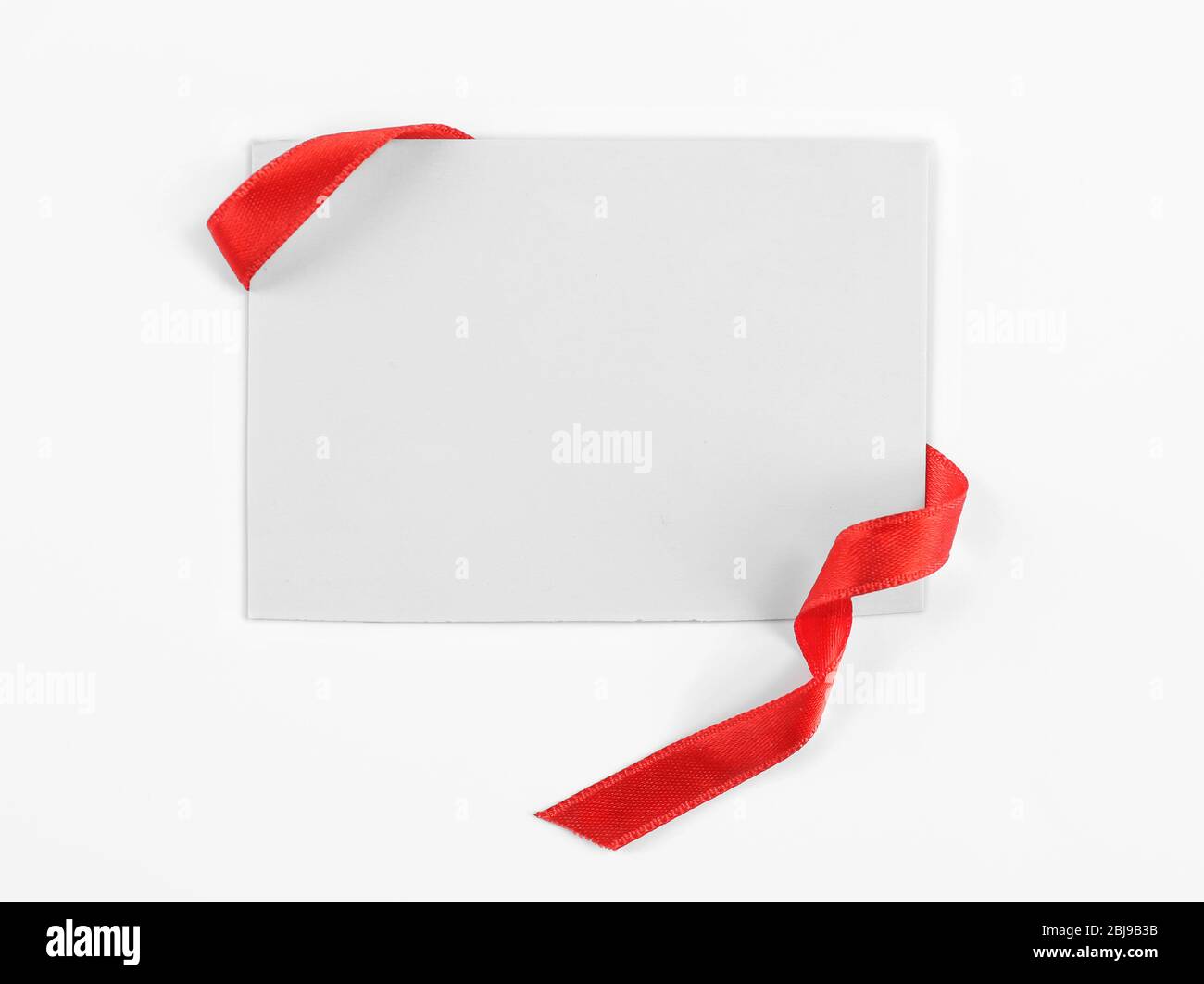 Red Ribbon Note Note card with red ribbon on white background Stock Photo - Alamy