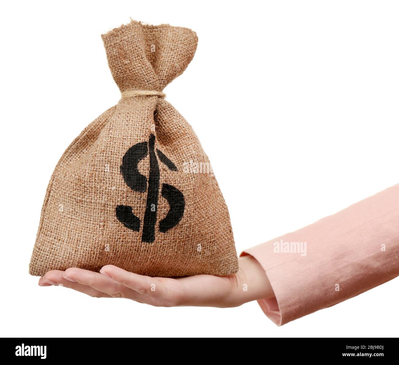 Hand holding money bag isolated on white Stock Photo Alamy