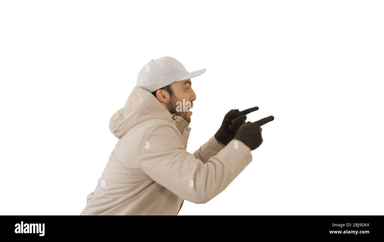 Hip-hop man singing rap, walking and making gestures on white background. Stock Photo