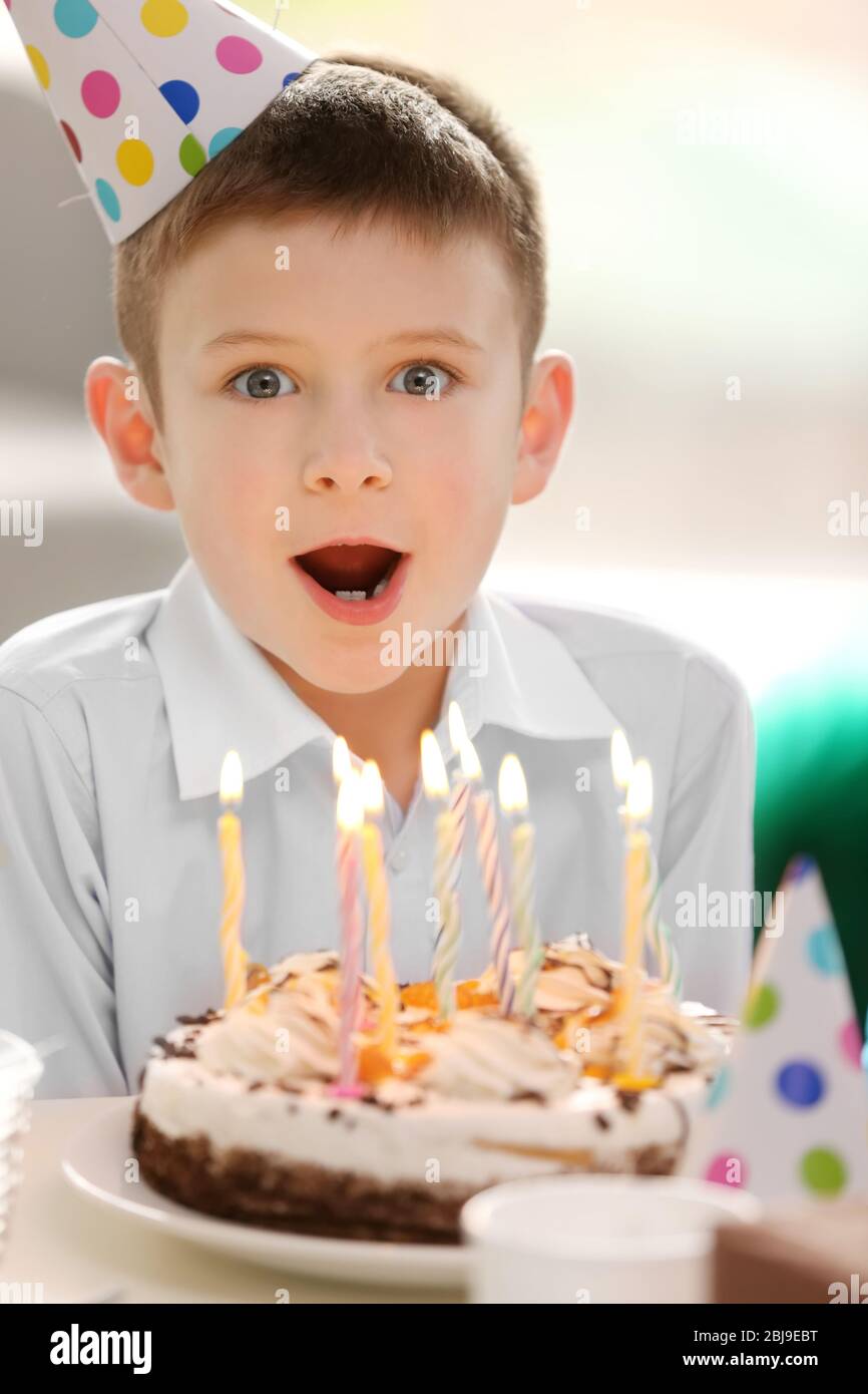 Happy boy with birthday cake Stock Photo Alamy