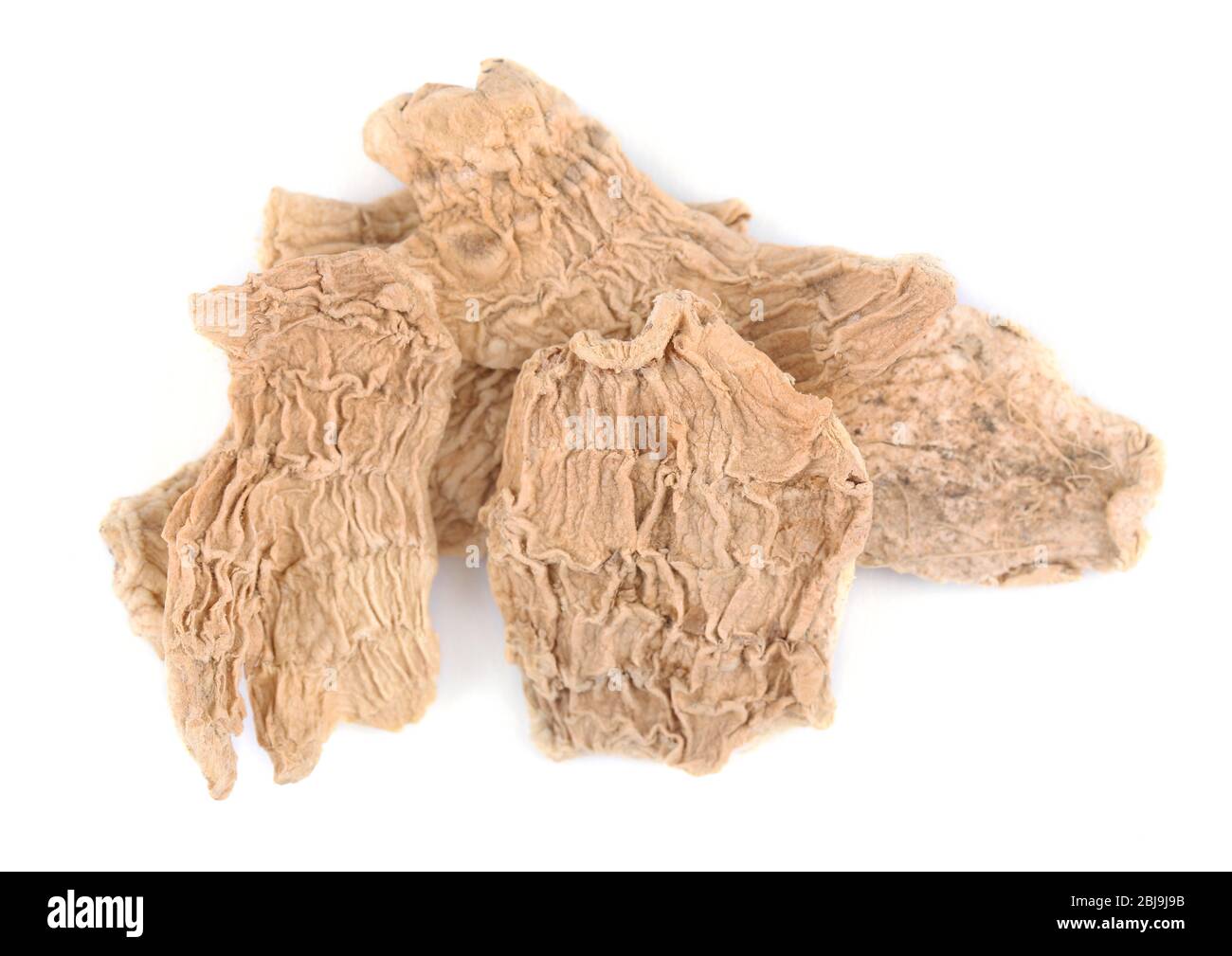 Dried ginger slices isolated on white Stock Photo Alamy