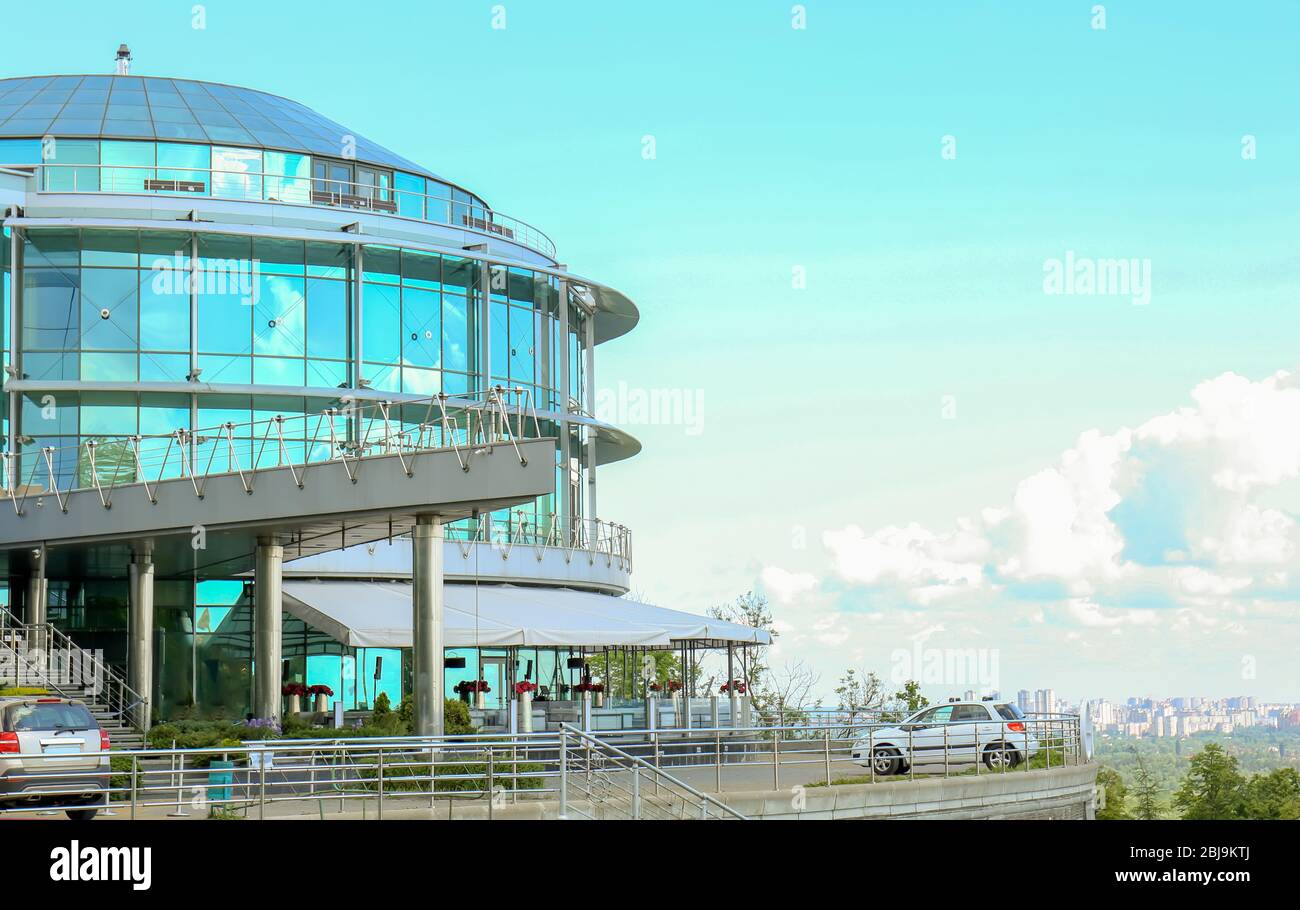 Modern office building on blue sky background Stock Photo - Alamy