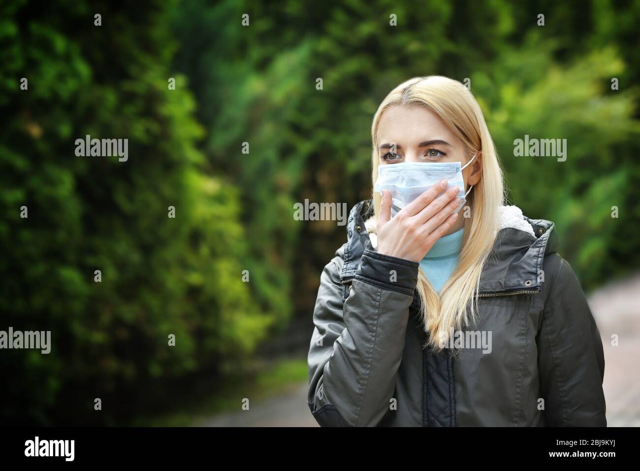 Blurred woman wearing face mask hi-res stock photography and images - Alamy