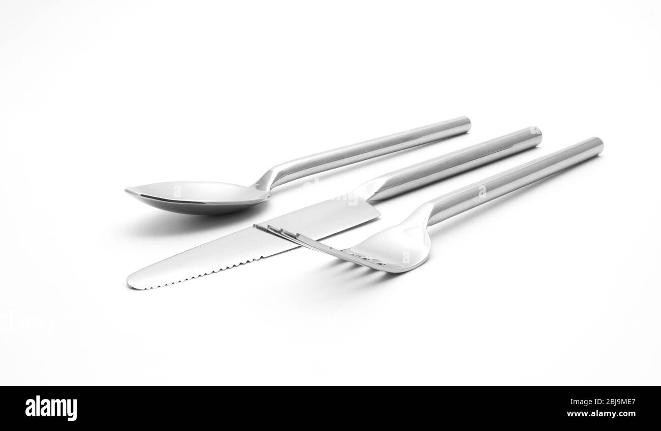 cutlery set with fork knife and spoon on white Stock Photo - Alamy