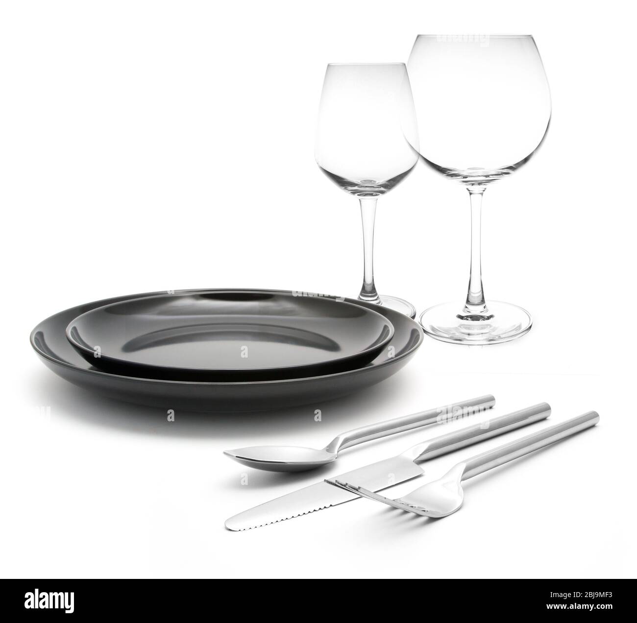 Empty Plate Cup Fork Spoon Knife Black Kitchen Utensils Set Stock Photo by  ©karandaev 319400556
