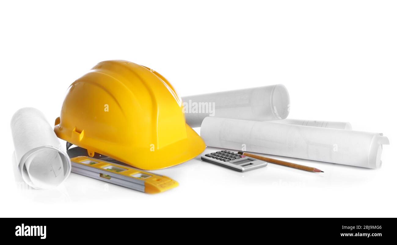 Construction drawings with tools and helmet isolated on white Stock Photo