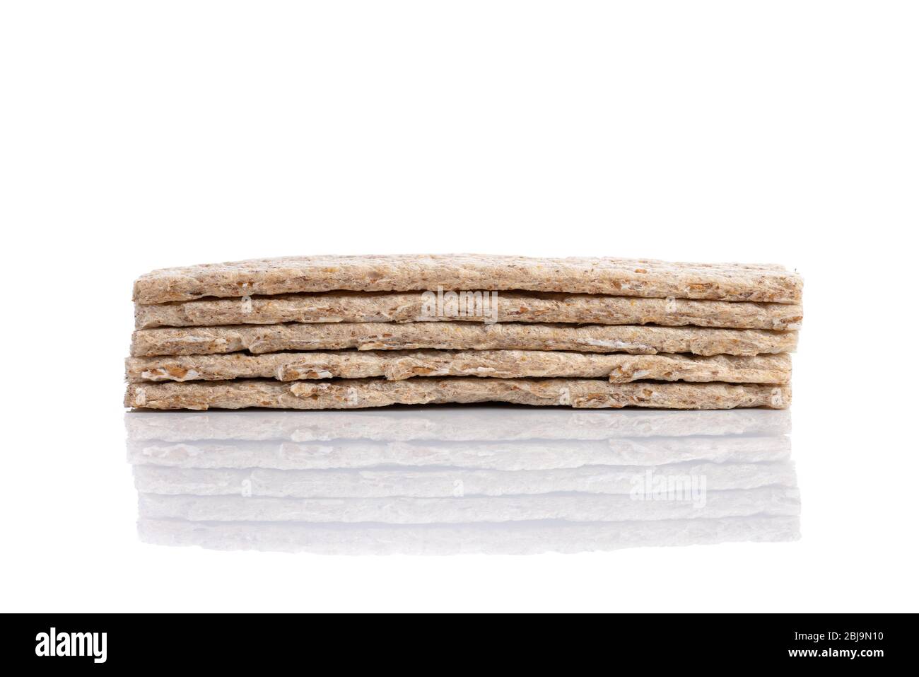 Stack of grain crisp bread isolated on a white background. Stock Photo