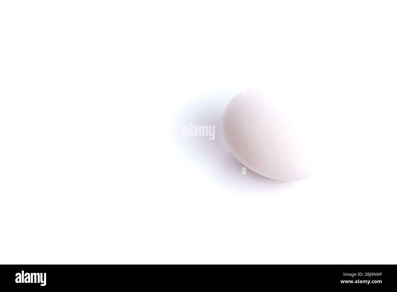 White chicken egg isolated over white background Stock Photo - Alamy