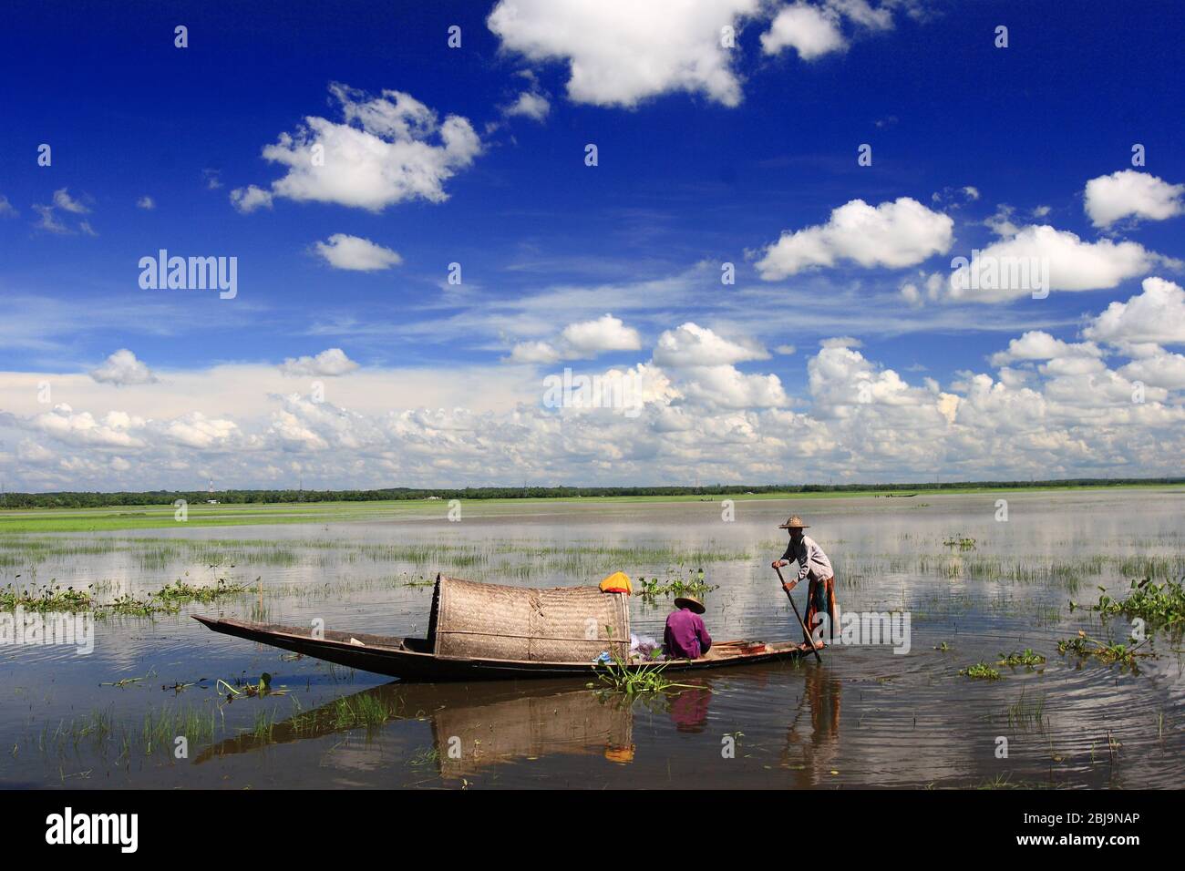 Fishermen Fishing on the Tanguar Haor also called Tangua Haor using Boats. It is a Unique Wetland Ecosystem. 17th August, Sunamganj, Bangladesh 2017. Stock Photo
