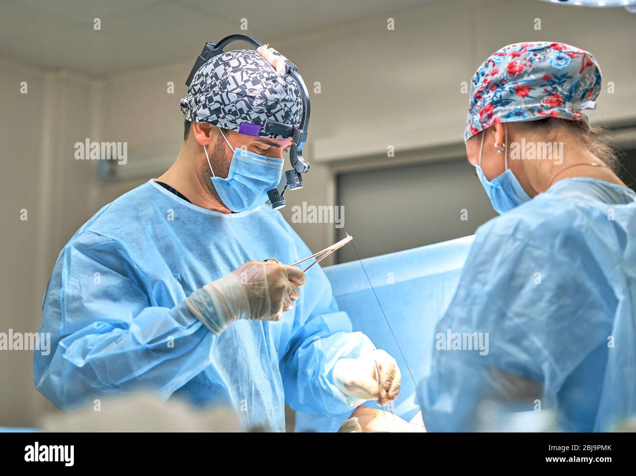 doctor performs plastic surgery Stock Photo Alamy