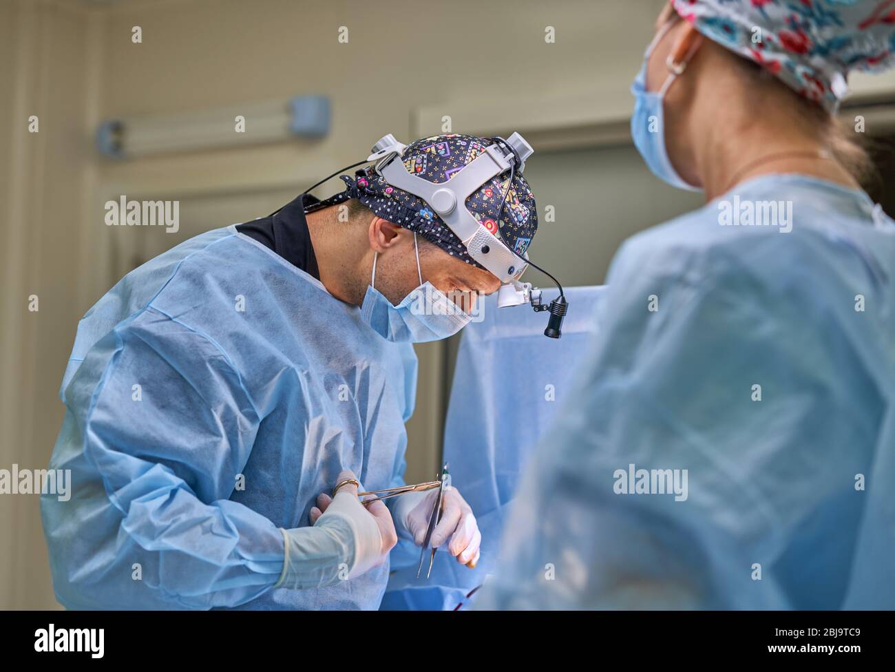 doctor performs plastic surgery Stock Photo Alamy