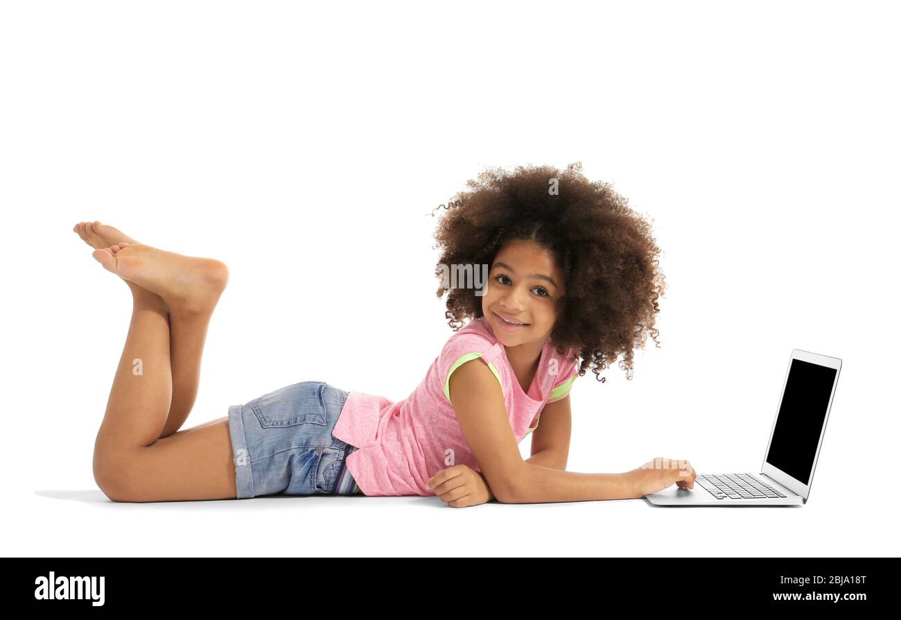 Happy African girl with laptop, isolated on white Stock Photo - Alamy