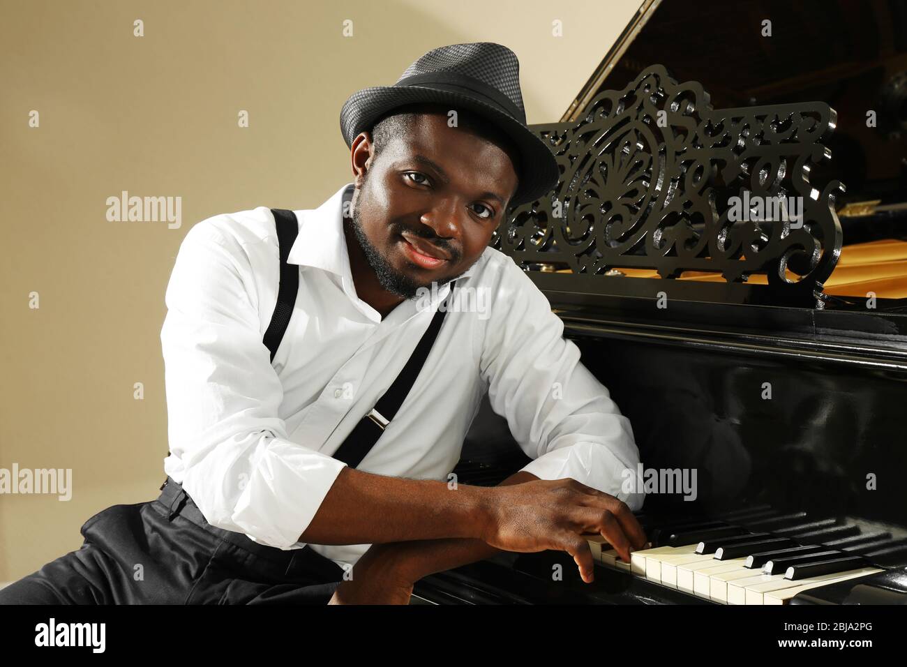 African american man playing piano hi-res stock photography and images