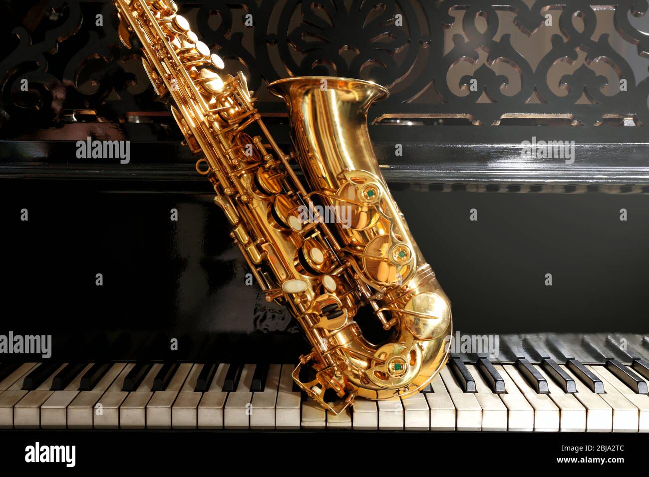 Piano and saxophone, closeup Stock Photo - Alamy