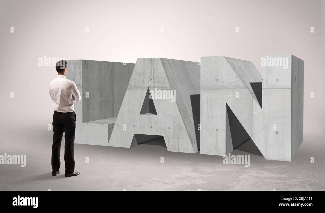 Rear view of a businessman standing in front of LAN abbreviation