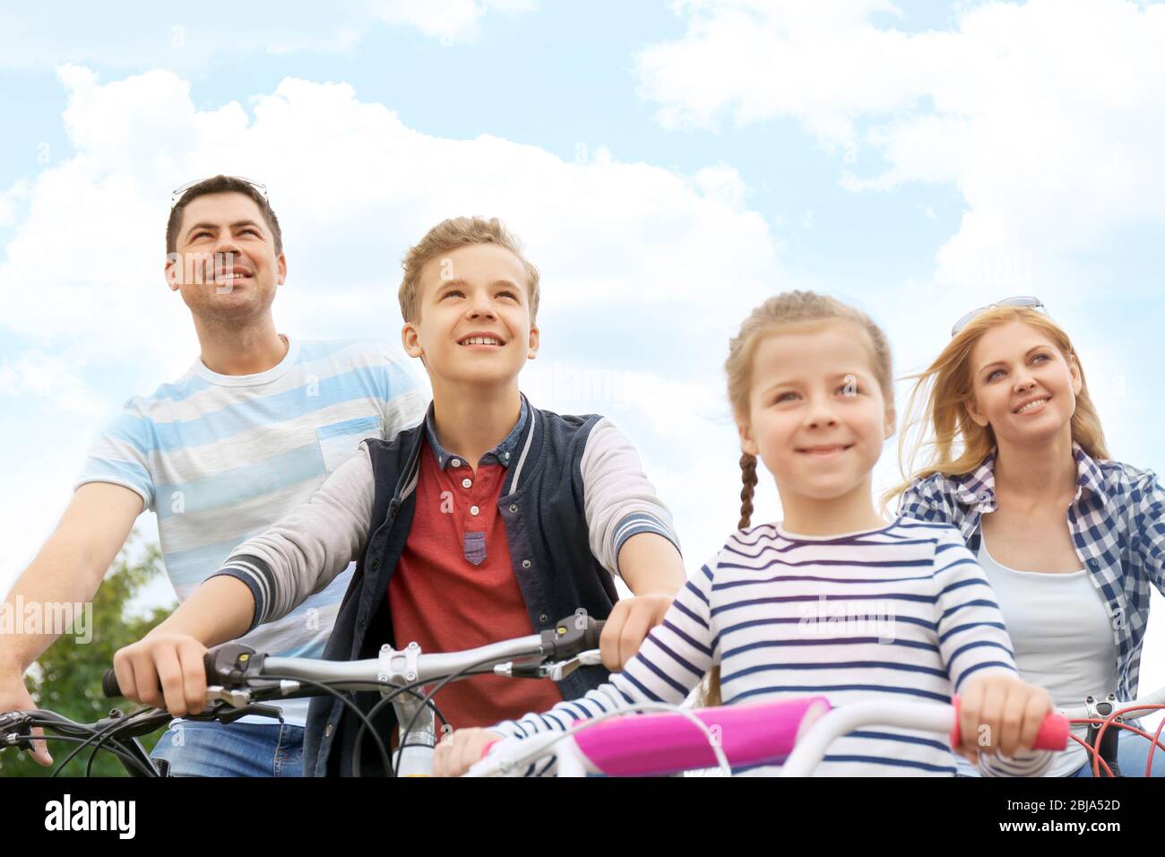 Happy Bike Ride Happy family on bike ride Stock Photo - Alamy