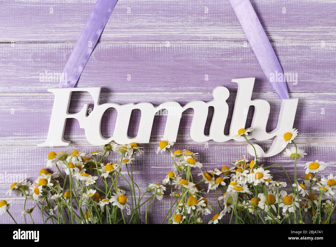 Word Family with flowers on color background Stock Photo - Alamy