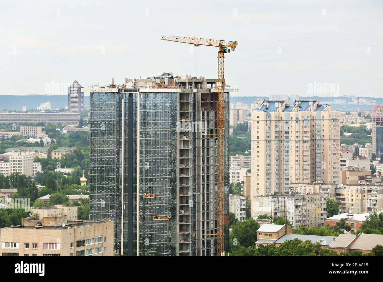 Construction site with high-rise building Stock Photo - Alamy