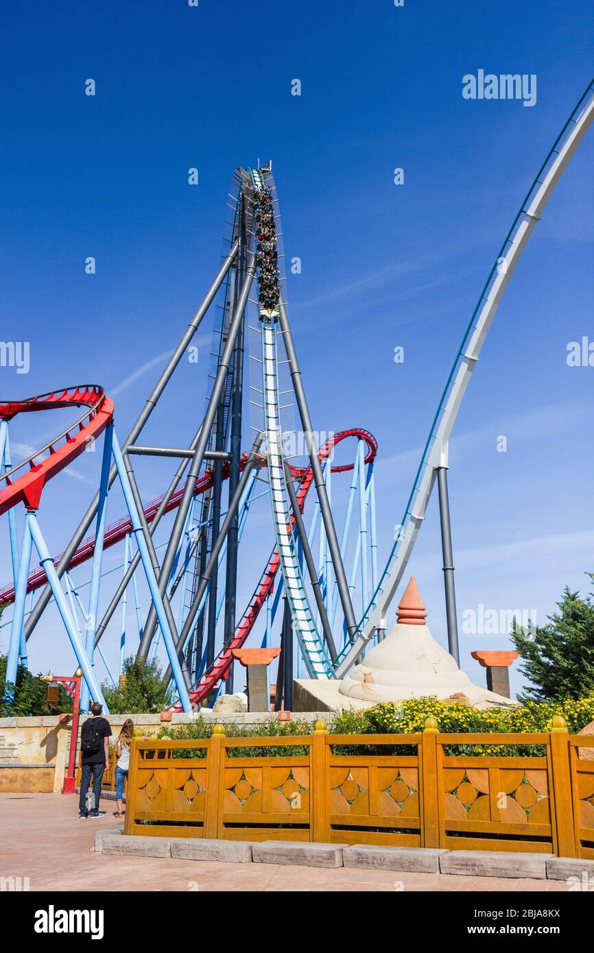 Port Aventura World, Salou, Spain. July 2019. Shambahla, the second highest roller  coaster in Europe. Vertical shot of the train with riders Stock Photo -  Alamy
