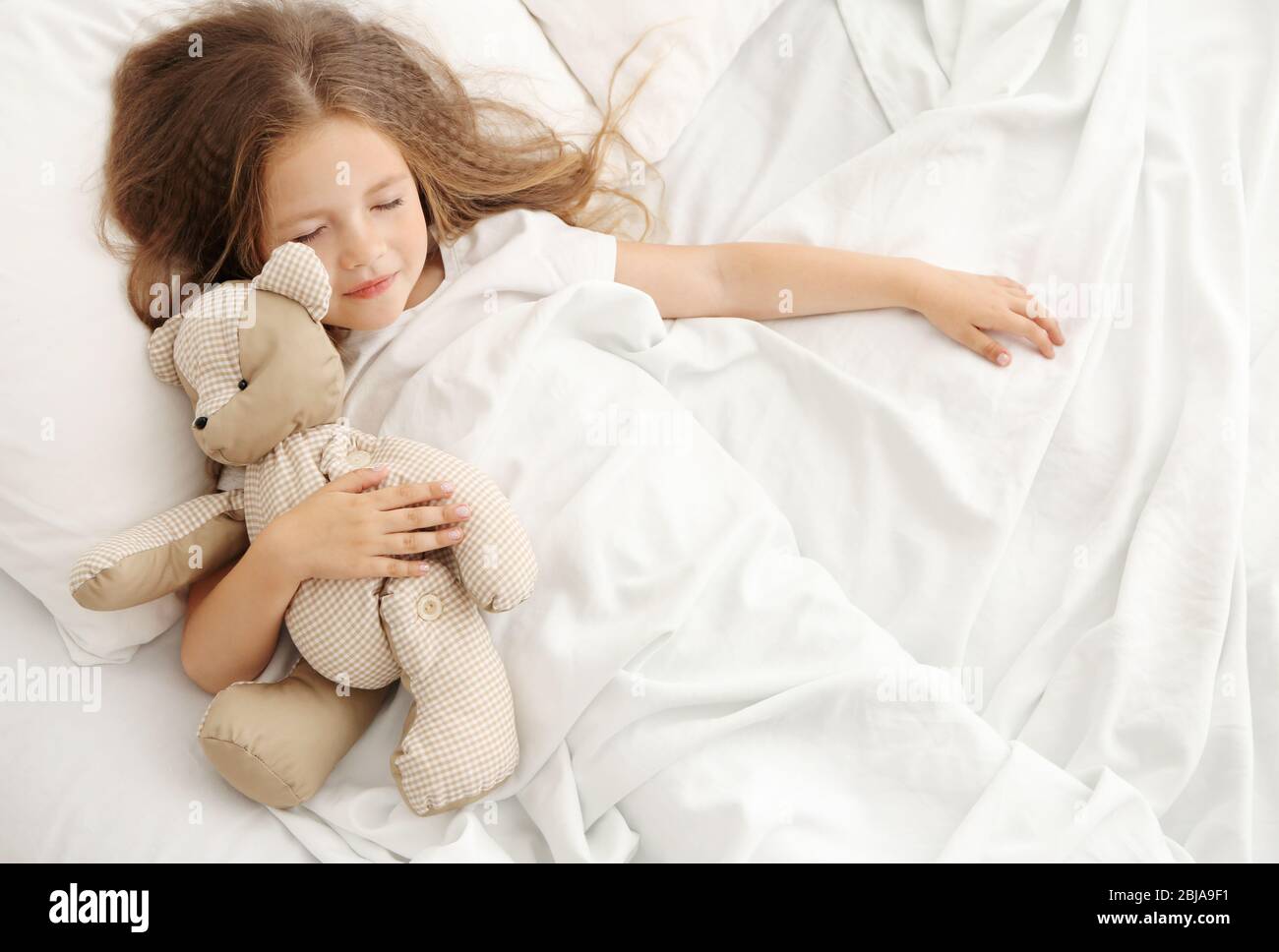 cute little girl with teddy bear