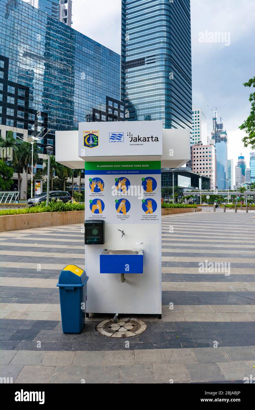 Jakarta, Indonesia - 3rd Apr 2020: Portable washbasin in Central Jakarta, Indonesia. Washing hands often is a way to reduce covid-19 pandemic. Stock Photo