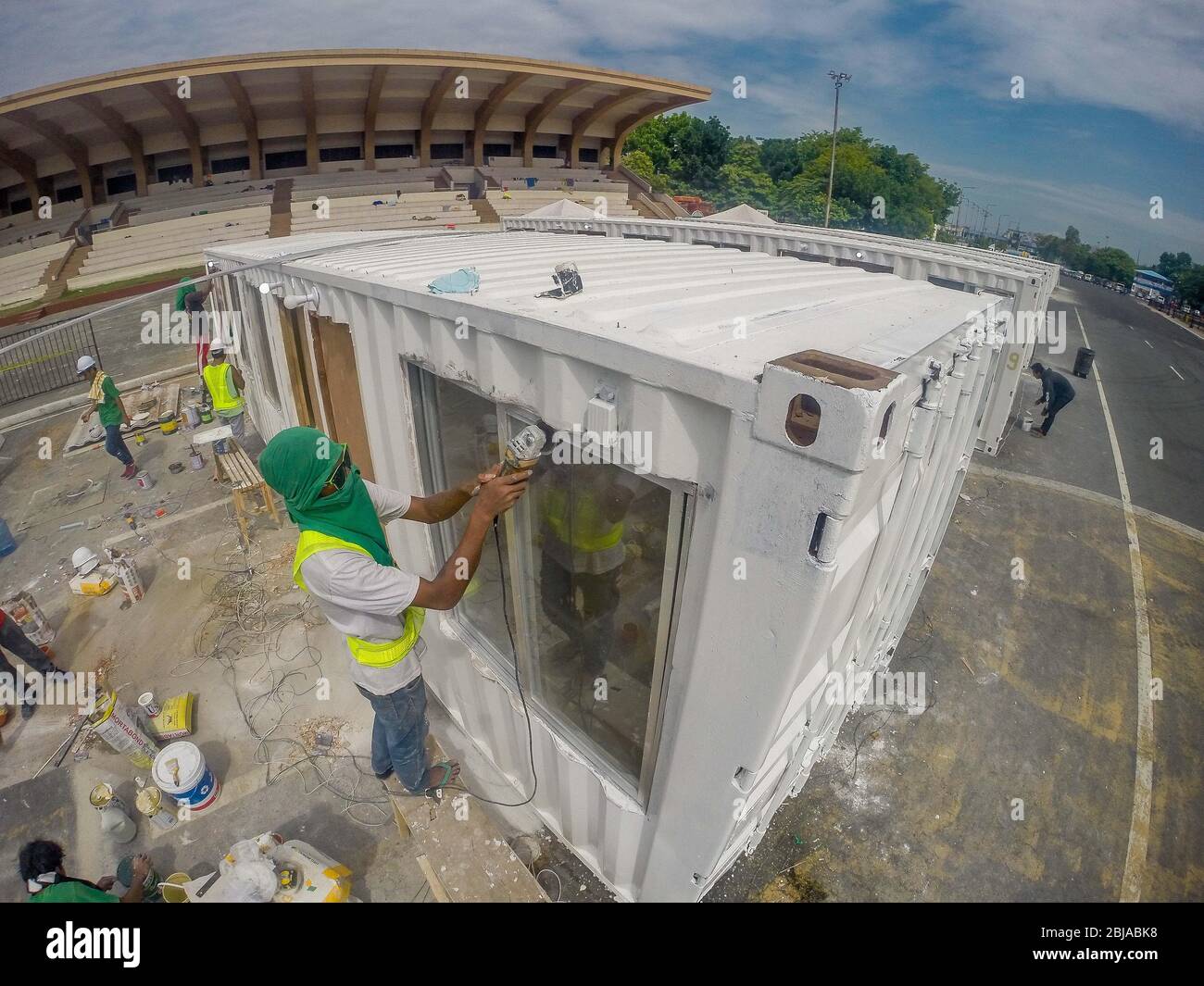 Manila, Philippines. 29th Apr, 2020. Workers from Department of Public Works and Highways (DPWH) of the Philippines prepare containers that will be converted into temporary medical facilities in Manila, the Philippines, on April 29, 2020. Credit: Rouelle Umali/Xinhua/Alamy Live News Stock Photo