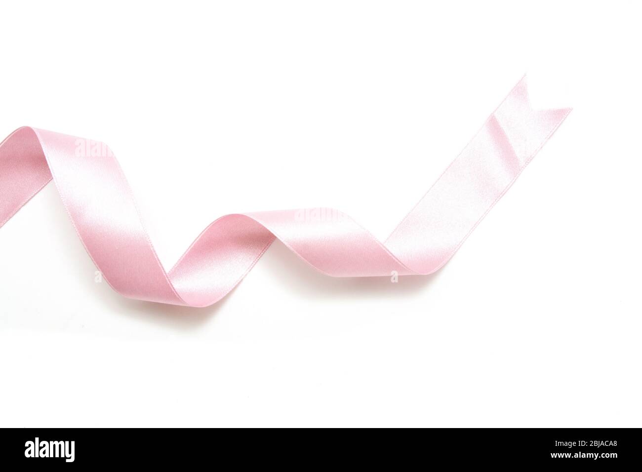 Pink ribbon bow in isolated on white background Stock Photo - Alamy