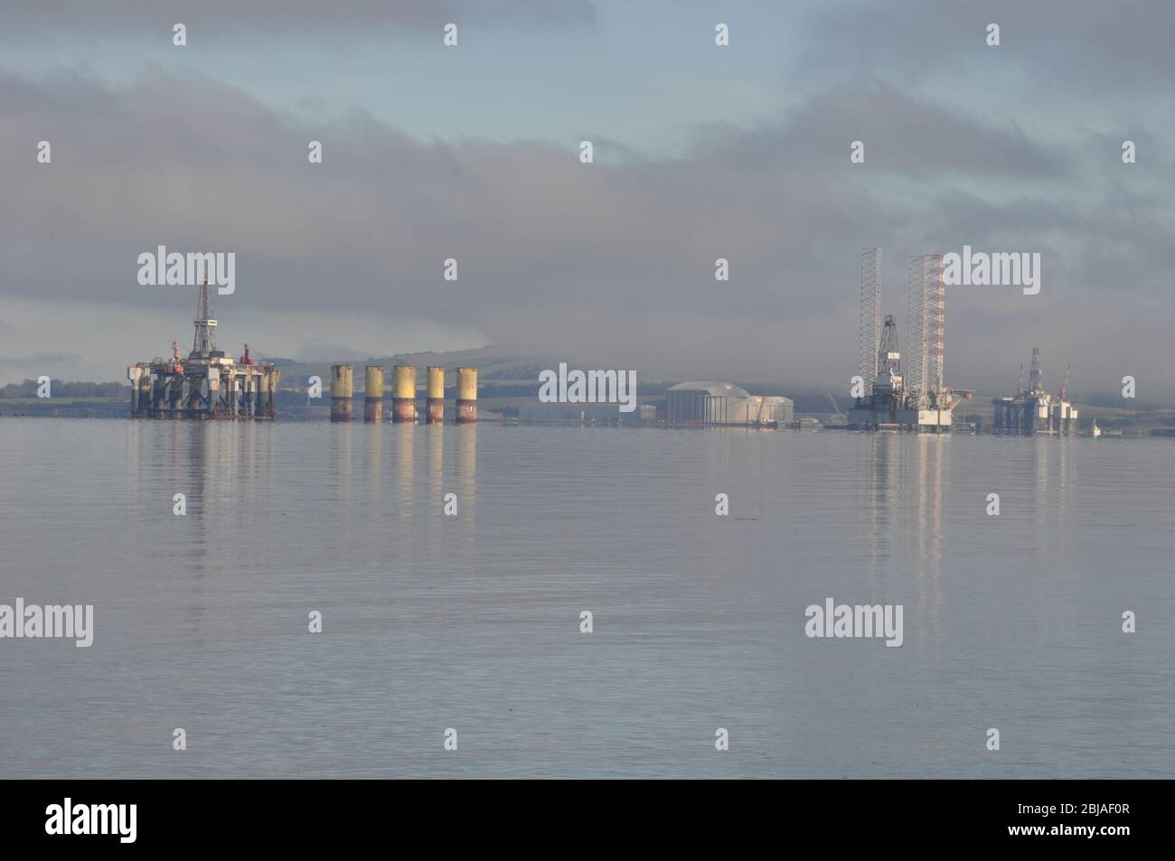 Oil Rigs in the Cromarty Firth, Scotland viewed from Balblair Stock Photo