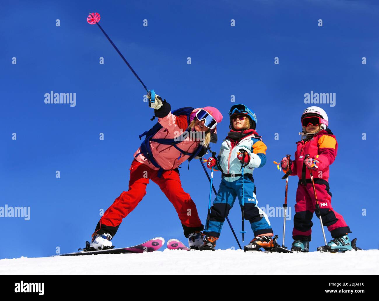 Woman and her two daughters go skiing, France, Savoie, Sainte-Foy-Tarentaise Stock Photo