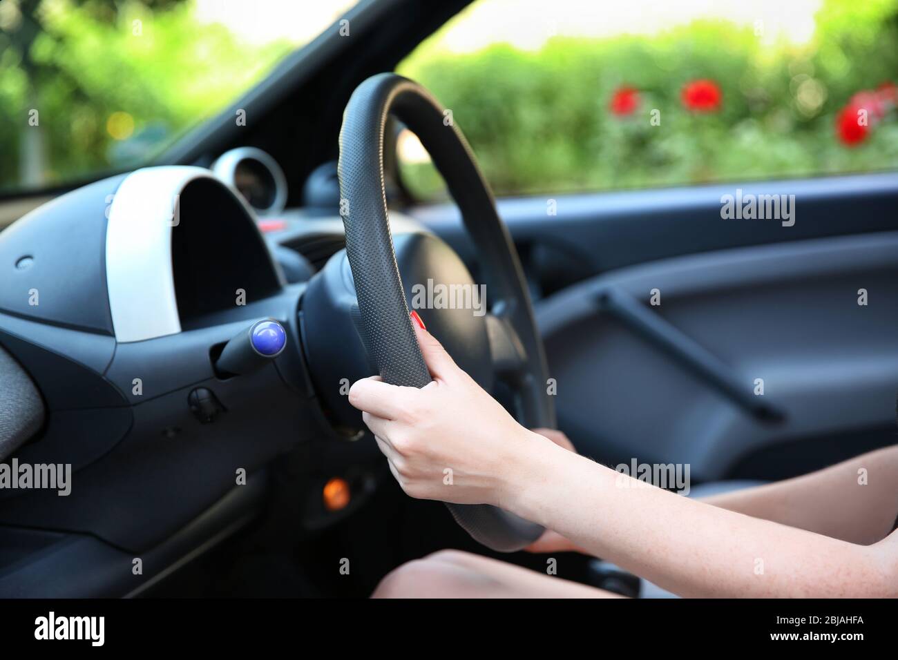 Female hands on steering wheel hi-res stock photography and images - Alamy