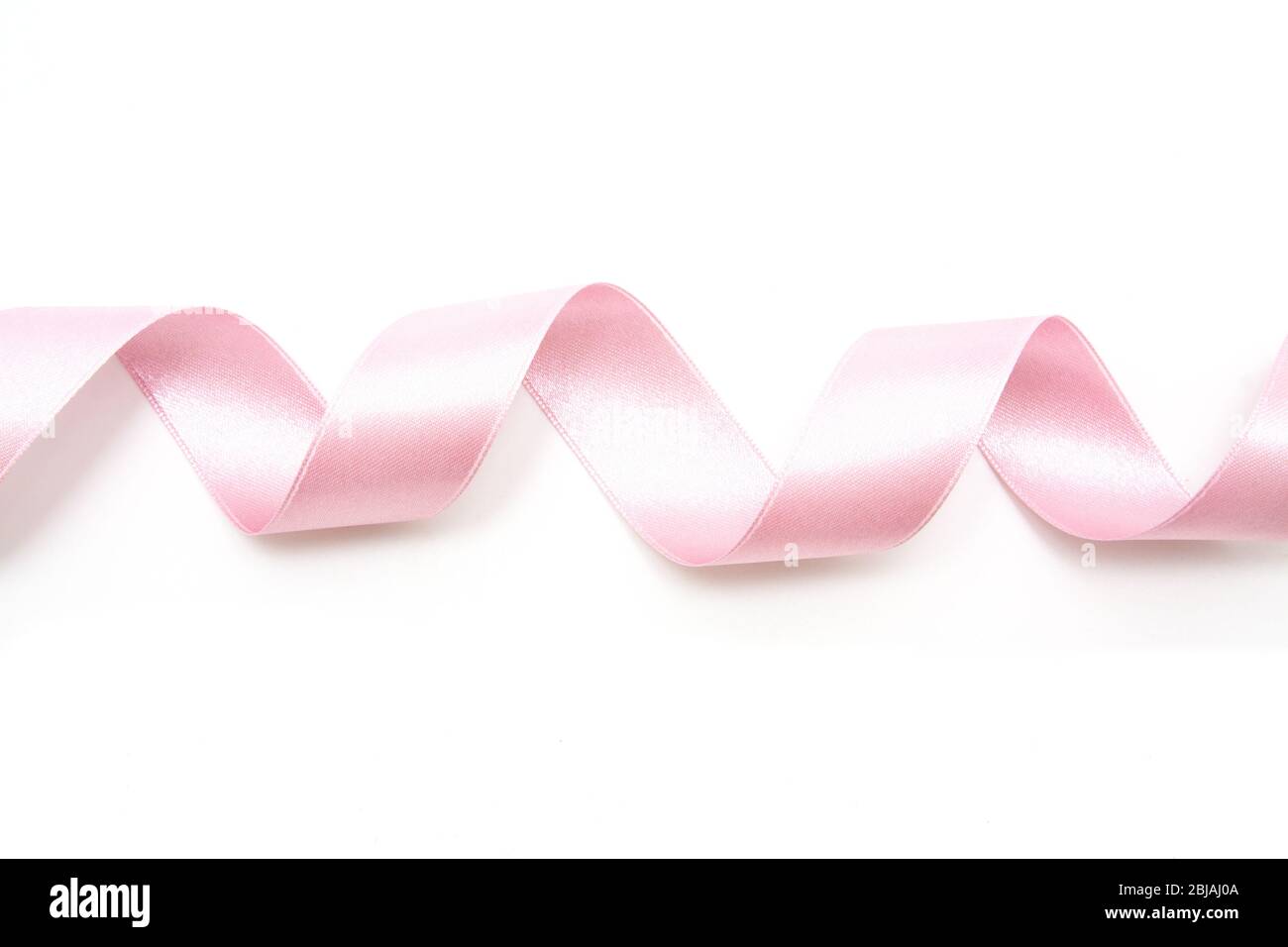 Pink ribbon bow in isolated on white background Stock Photo - Alamy