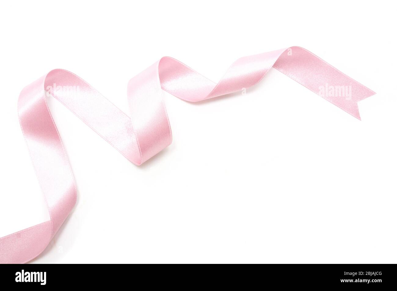 Pink ribbon bow in isolated on white background Stock Photo - Alamy