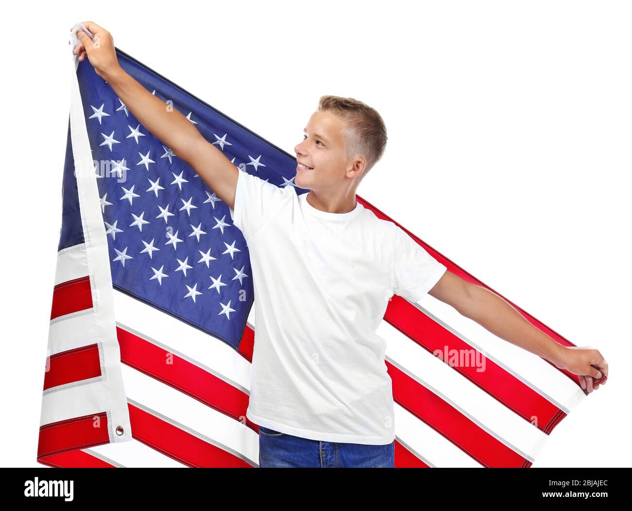 Boy holding American flag, isolated on white Stock Photo - Alamy