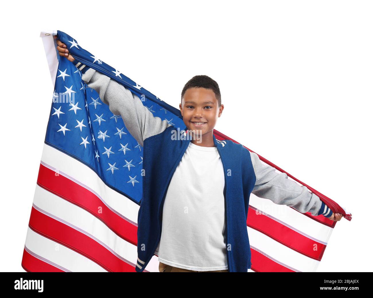 Boy holding American flag, isolated on white Stock Photo - Alamy
