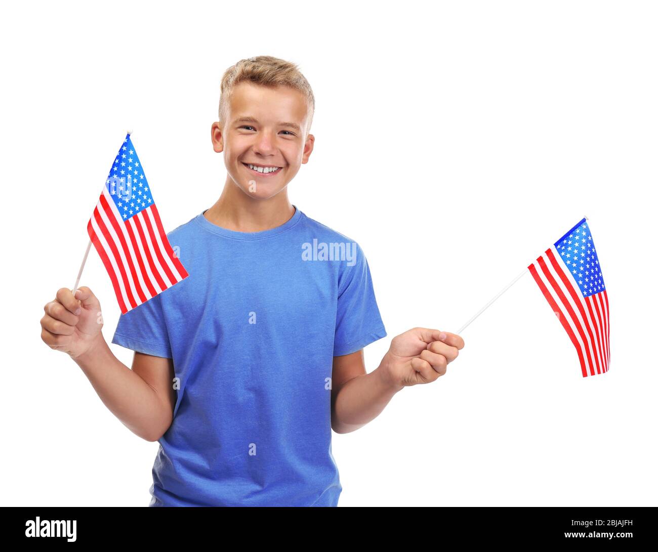 Boy holding American flags, isolated on white Stock Photo - Alamy