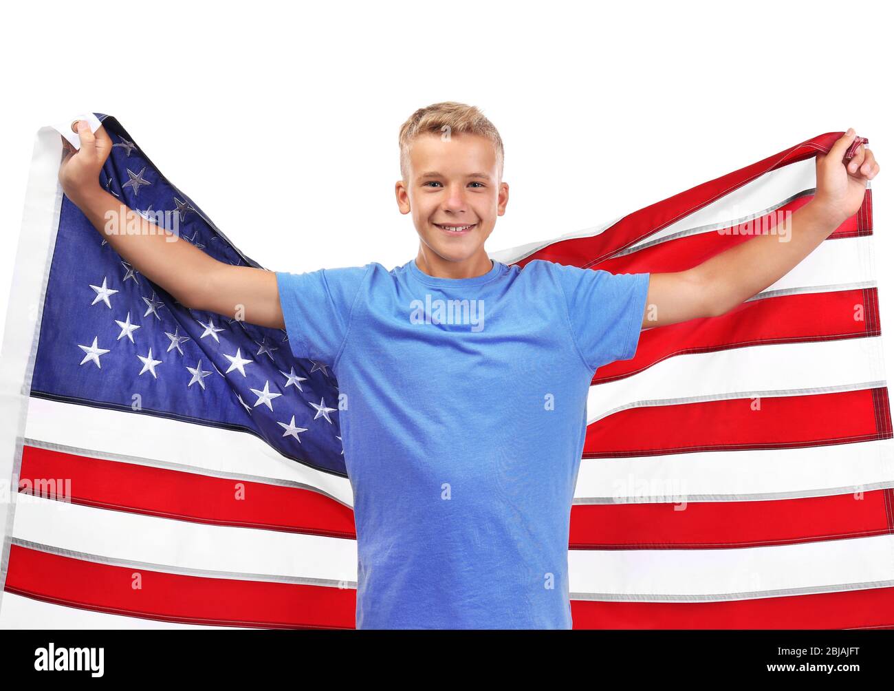 Boy holding American flag, isolated on white Stock Photo - Alamy