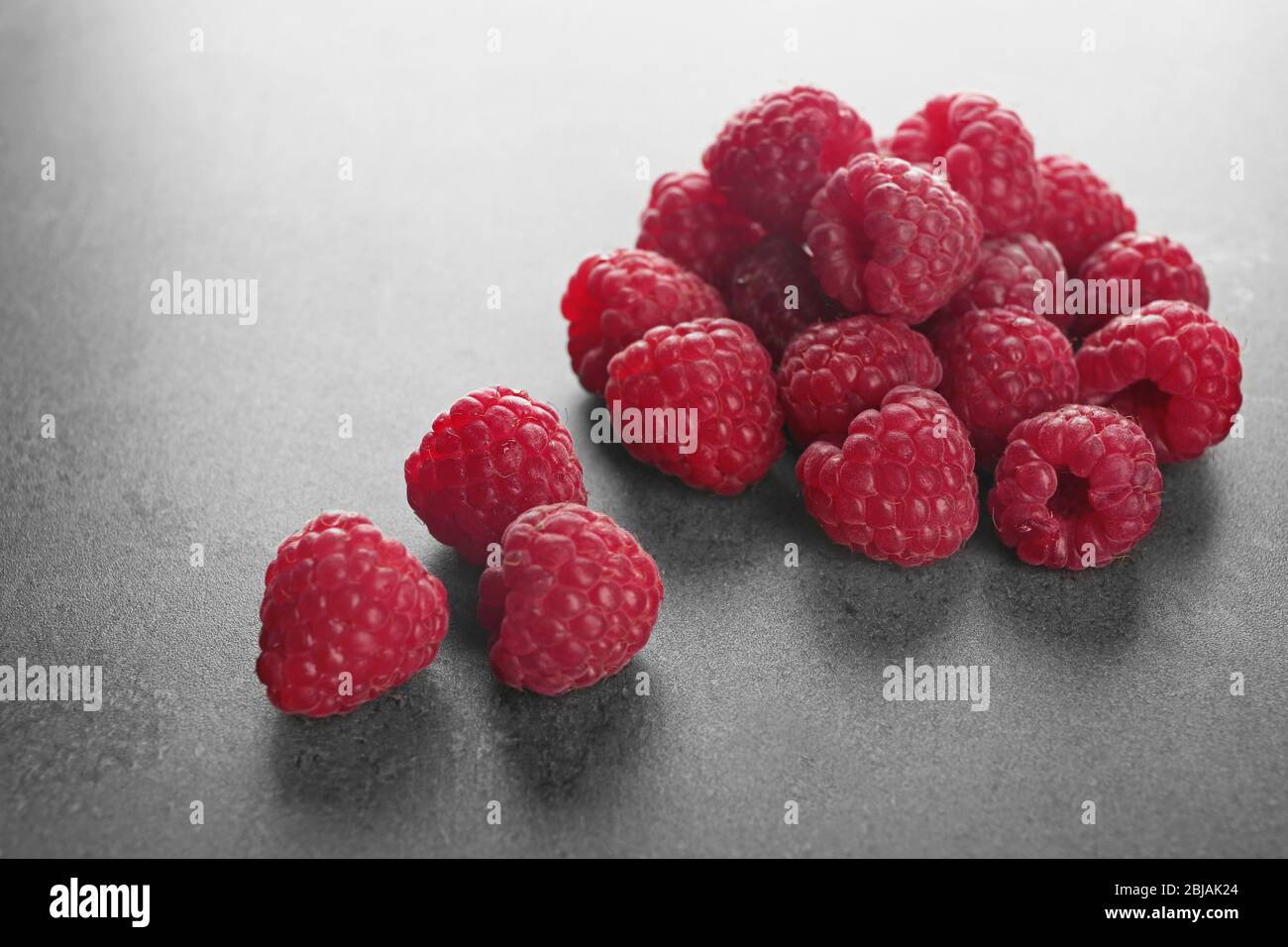 Grey Brown Raspberry Fresh raspberry on grey table Stock Photo - Alamy