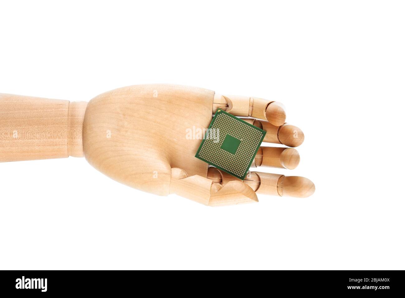 Wooden hand holding processor on white background Stock Photo