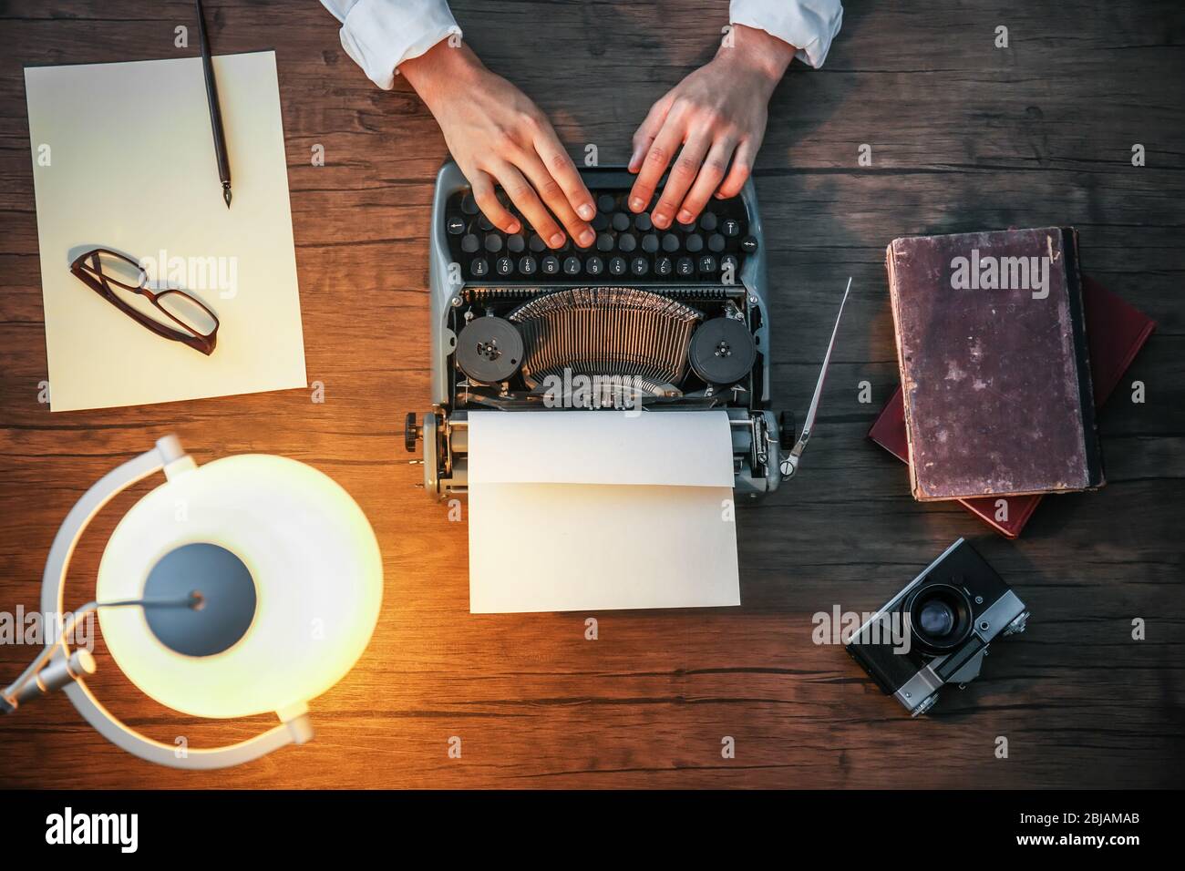 Retro reporter working at the table, top view Stock Photo - Alamy